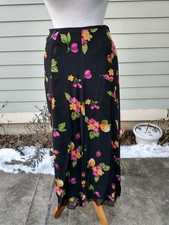 Skirt: silk, black, botanical print, 7" side zip. Size 4 - by Dana Buchman