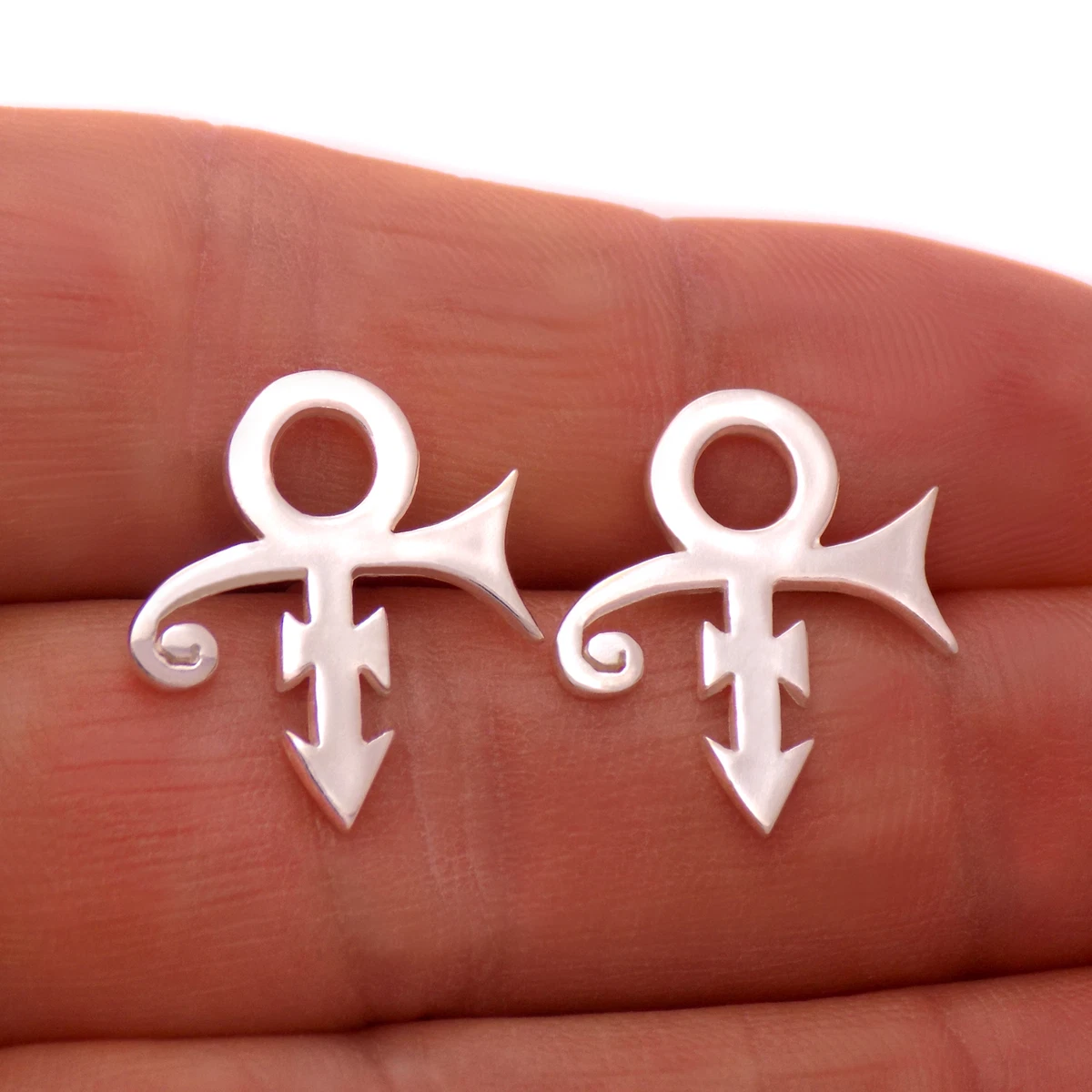Prince love symbol best sale earrings