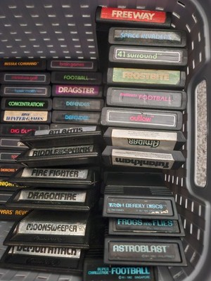 Atari 2600 Retro Rainbow Jr lot with accessories and 59 games