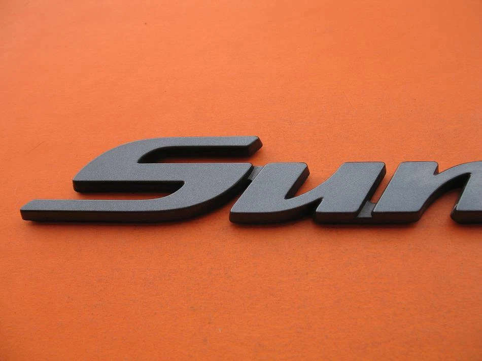 00 01 02 03 04 05 PONTIAC SUNFIRE PUERTA LATERAL EMBLEMA LOGOTIPO INSIGNIA SIGNO SÍMBOLO OEM Foto 2 de 4