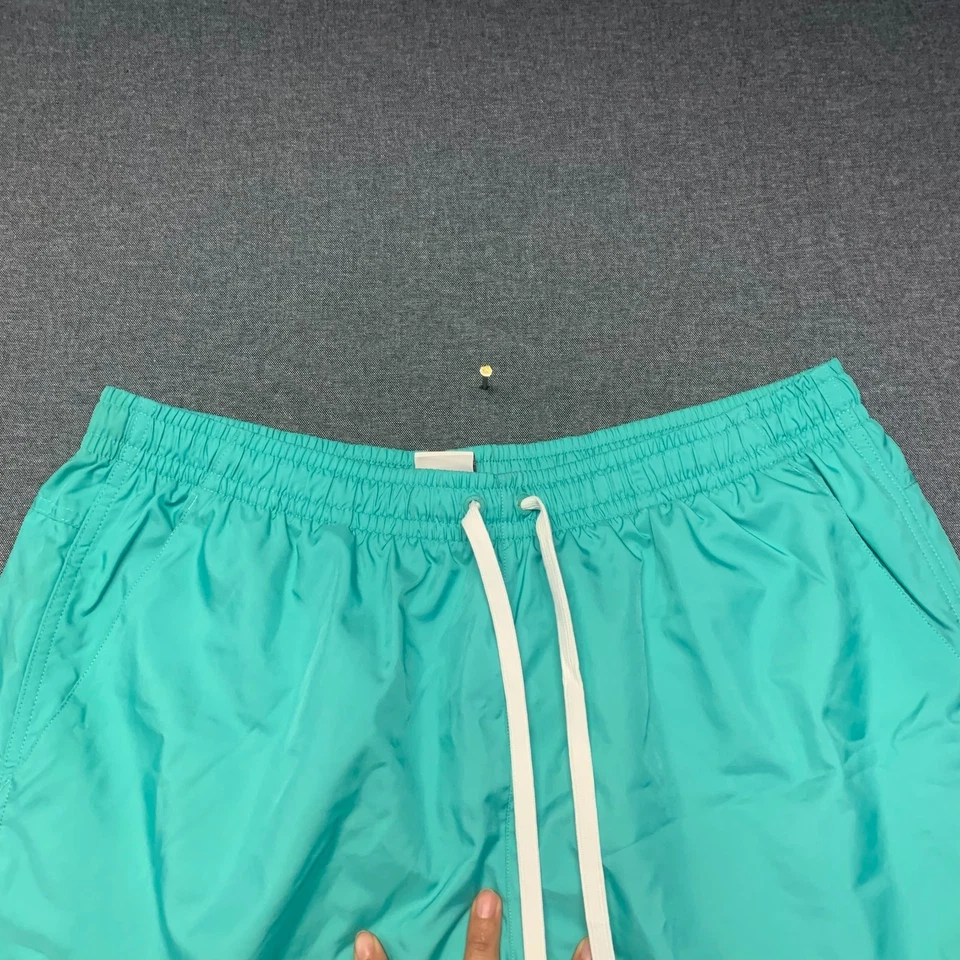 Pantalones cortos de natación Nike para hombre talla XL verde azulado forrados con cordón malla poliéster Foto 2 de 4