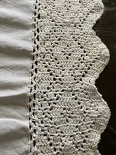 New Essential Home  2 Valances.  Solid cream color  58”X 14”