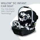 Black and white cow-print Britax Willow SC Infant car seat with silver handle and ClickTight technology.