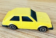 Vintage 1982 Tonka Ford Escort Race Car - The Tough Ones yellow toy 3” Length