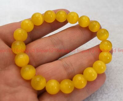 Hübsches natürliches 6/8/10 mm gelbes Katzenauge rund Edelstein Perlen Armband 7,5 Zoll