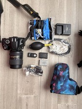 Nikon D5100: Digital SLR Camera 18-300mm f1:3.5-6.3G DX VR Lens