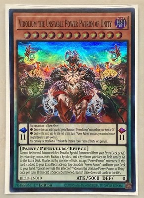 Vidolium the Unstable Power Patron of Unity 1st Edition Super Rare Blazing Domin