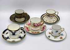 Lot of Five Porcelain Coffee Can and Saucer Sets.