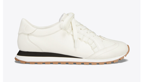 tory burch golf ruffle trainers