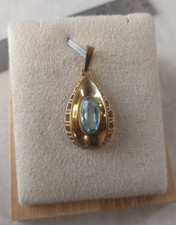 Ancien pendentif, en plaqué or et pierre bleue, art déco