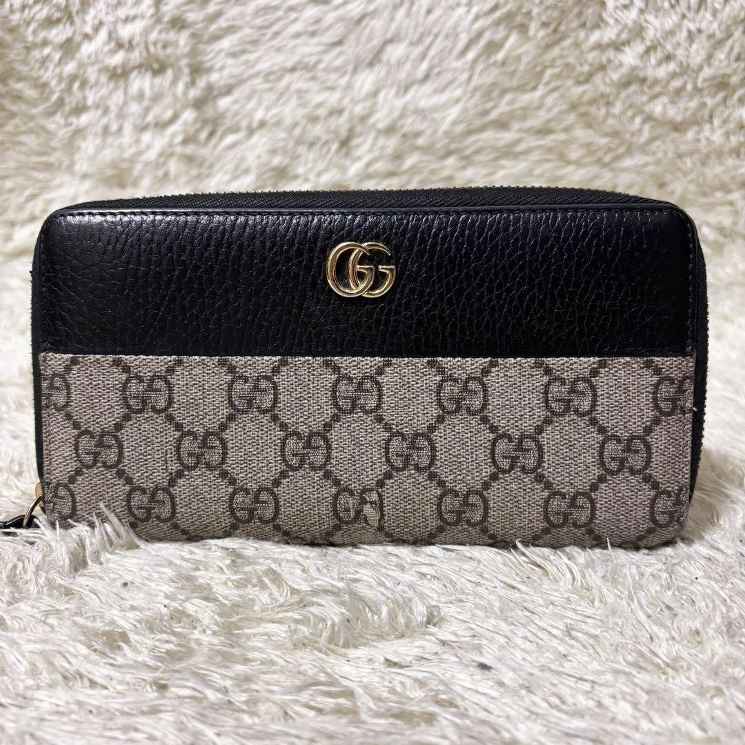 Portefeuille long Gucci Marmont GG Supreme rond zippé noir authentique