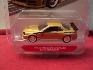Jada-2002-Nissan-Skyline-GT-R-BNR34-1-64-scale-nib-2019-release-gold-exterior