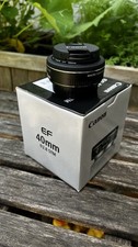 Canon EF 40mm f/2.8 STM Pancake Lens including Hoya 52mmUV filter.