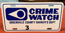 VINTAGE GREENVILLE SOUTH CAROLINA CRIME WATCH SIGN Booster License Plate Tag