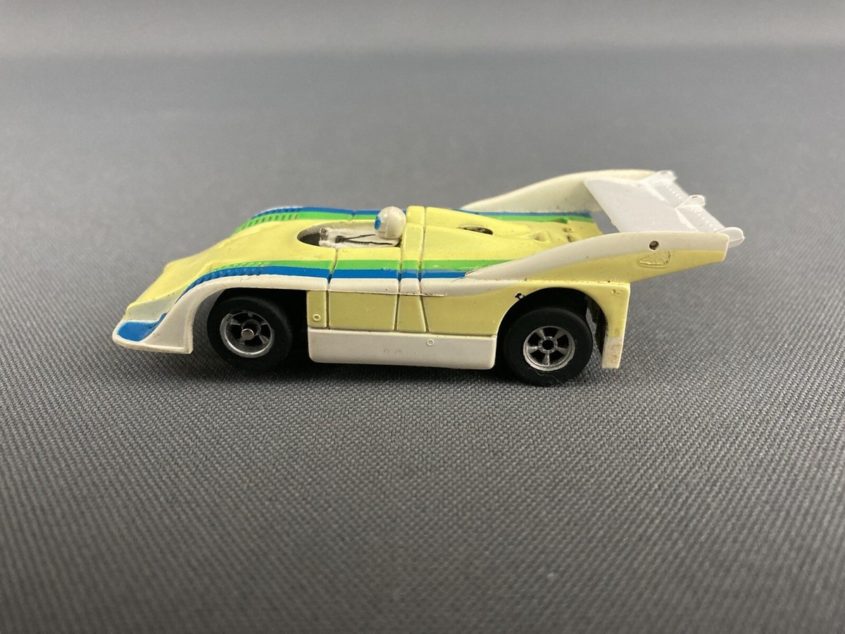 Aurora AFX HO Porsche 917 Can Am Slot Car - Wht/Blu/Grn/Yel