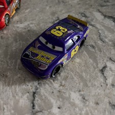 Disney Pixar Cars - TRANSBERRY JUICE LEE REVKINS Piston Cup - 1:55 Diecas