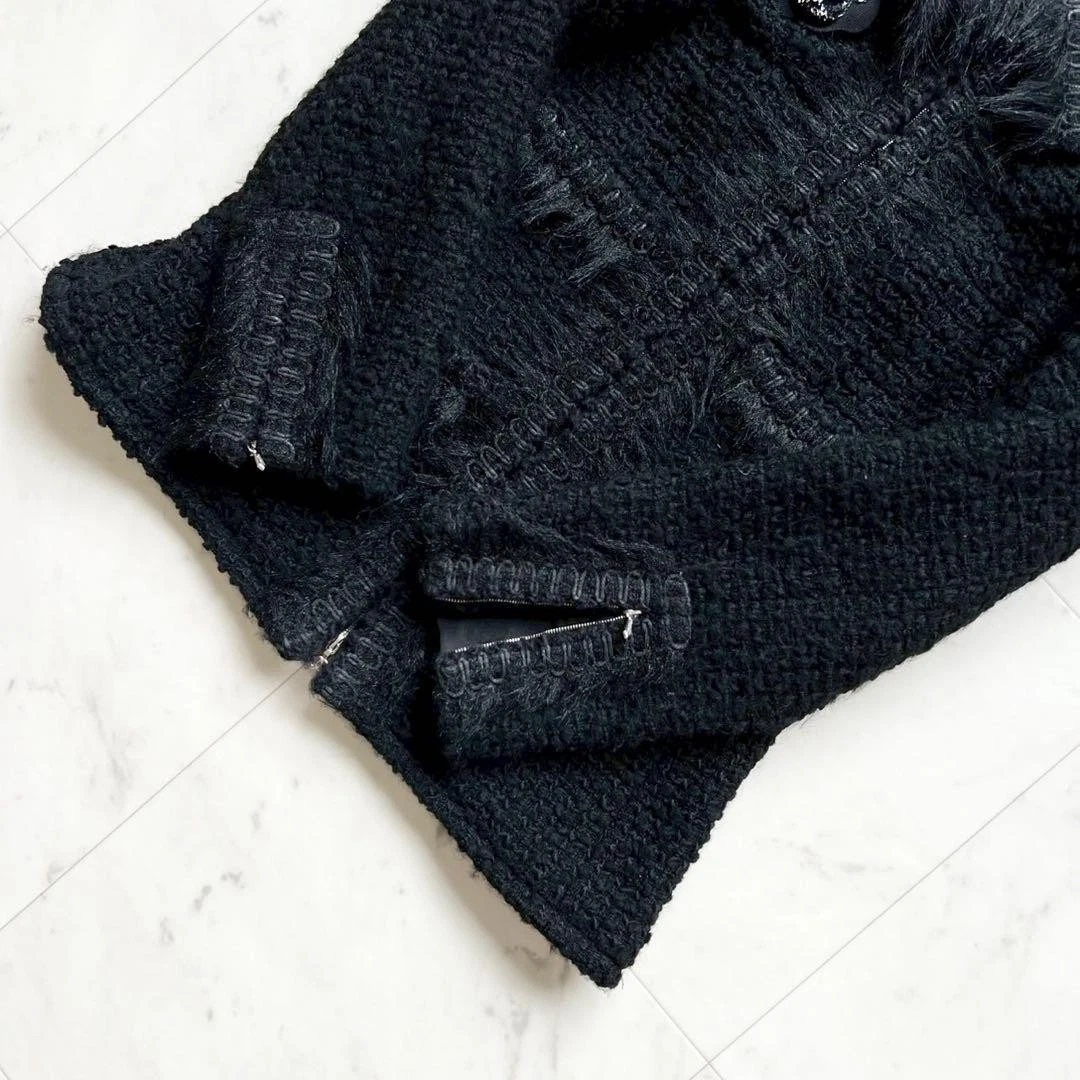 Charm Chanel Coco Mark con pelliccia di camelia giacca tweed 38