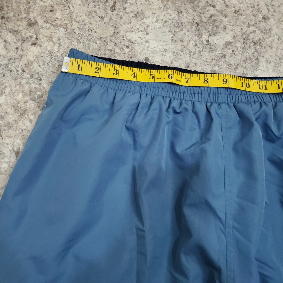 Pantalones deportivos Champion vintage para hombre XL azules anchos holgados dobladillo abierto polar logotipo Y2K Foto 3 de 4