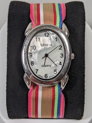 Geneva Pearlized Dial Silver Tone Oval Case Multi Color Canvas Band Watch
