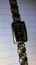Bulova Rectangular Black Dial Analog Wristwatch Silver Metal Bracelet Women