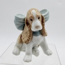 Nao by Lladro 'Puppy Present' Spaniel with a bow #1349, from 1999
