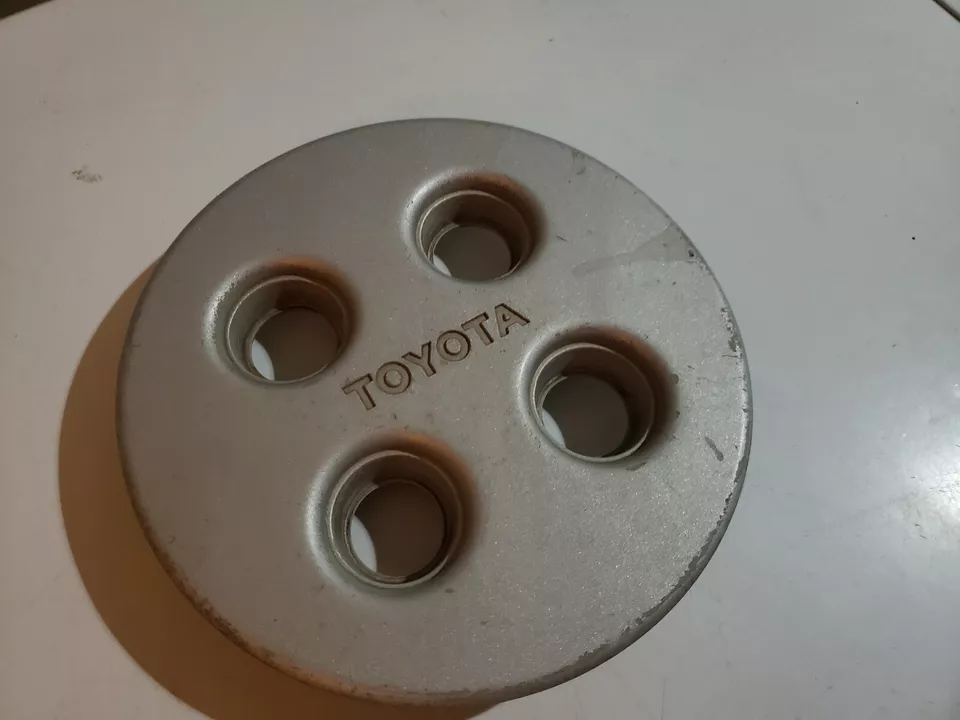Tapa central de rueda Toyota Celica Corolla 1990 4 orejetas plateada OEM #BX18 Foto 2 de 4