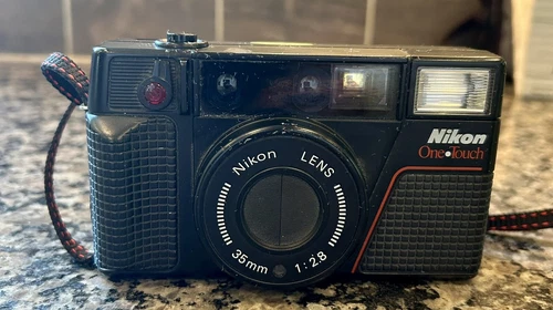 Nikon L35AF2 One Touch 35mm 2.8 Lens Point & Shoot Film Camera . Parts Or Repair