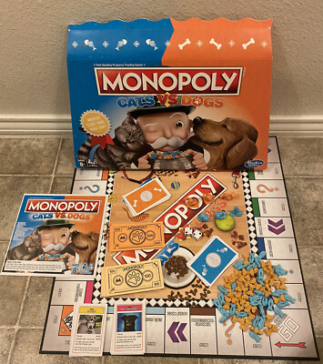 EXCELLENT CONDITION COMPLETE Kids Monopoly Game Cats vs Dogs Board Game Ages 8+