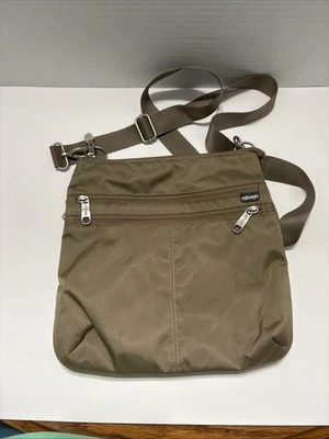 nike brasilia 9.5 medium training backpack Adidas 2026 Color:Chocolate Brown Crosshatch/Saddle Brown Bellroy Designers Edition Travel The front zip pocket