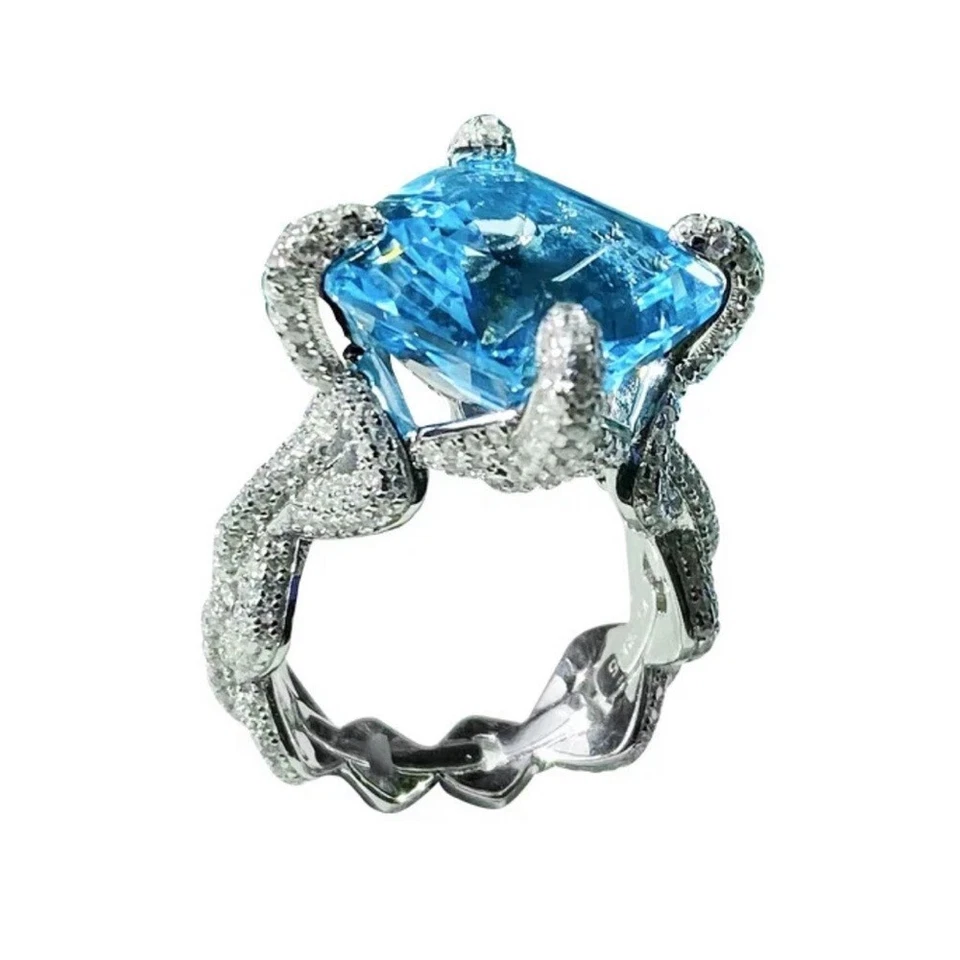 Impresionante anillo de cóctel pavé de cristal azul de 12 quilates Foto 3 de 4