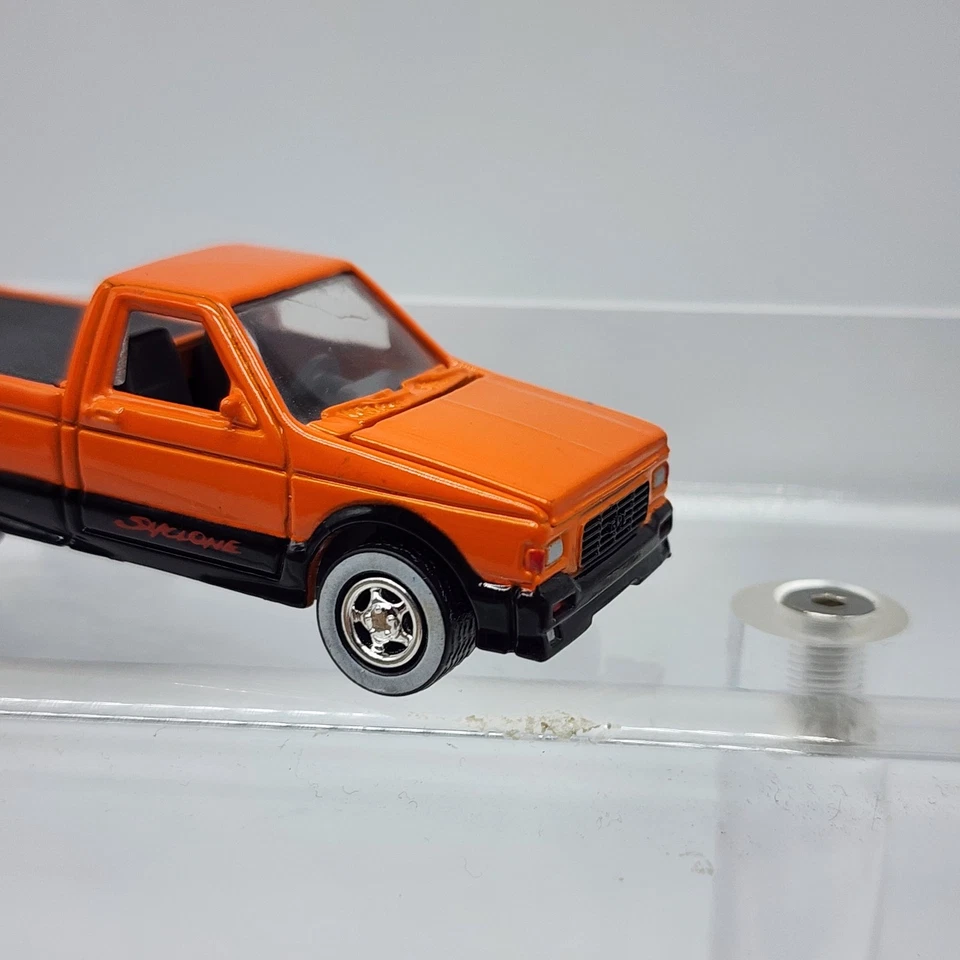 Lote de 2 Johnny Lightning 1991 GMC Syclone Truckin America naranja cobre raro Foto 2 de 4