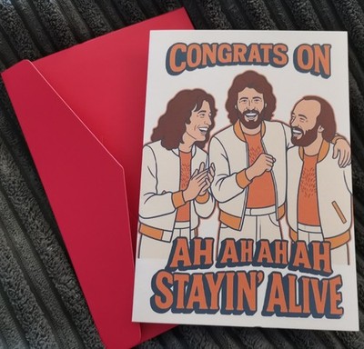 The Bee Gees - Geburtstagskarte ''Congrats On Stayin' Alive'' - roter Umschlag