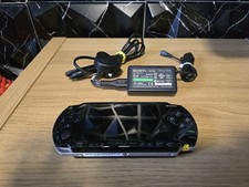 Sony PSP 1003 good condition with official Charger Cable - with 1 game