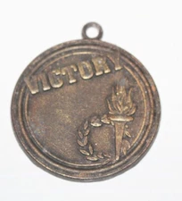 Vintage Victory Olympic Torch Medal Trophy - Relief Coin Medallion Dinn Bros.