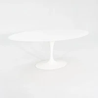 2010s Eero Saarinen for Knoll 78x48 inch Oval Dining table in White Laminate