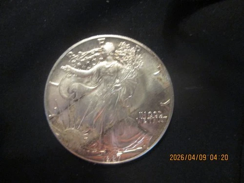 New Listing1987 american silver eagle $1 .999 fine silver, Unc. but damaged on OB