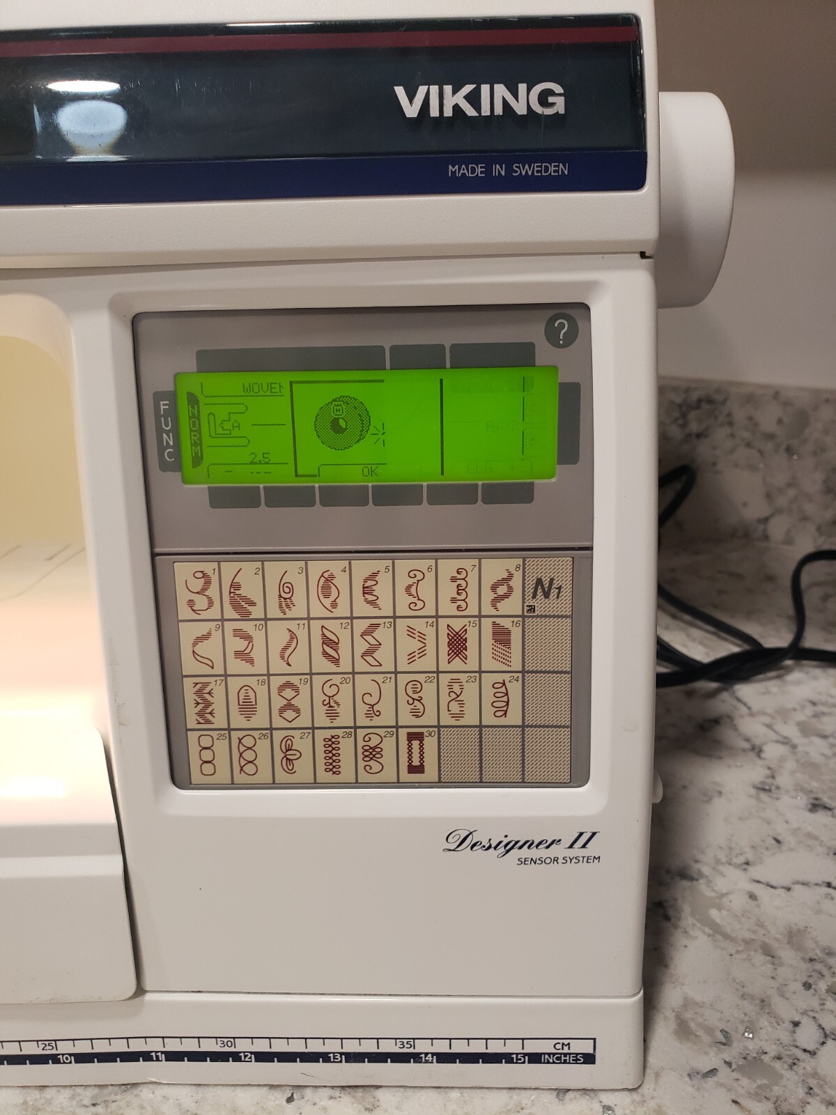 Husqvarna Viking Designer II sewing machine w/ case turns on