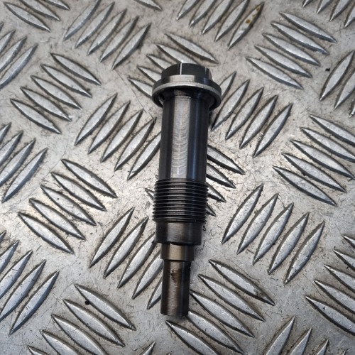 Timing belt chain tensioner