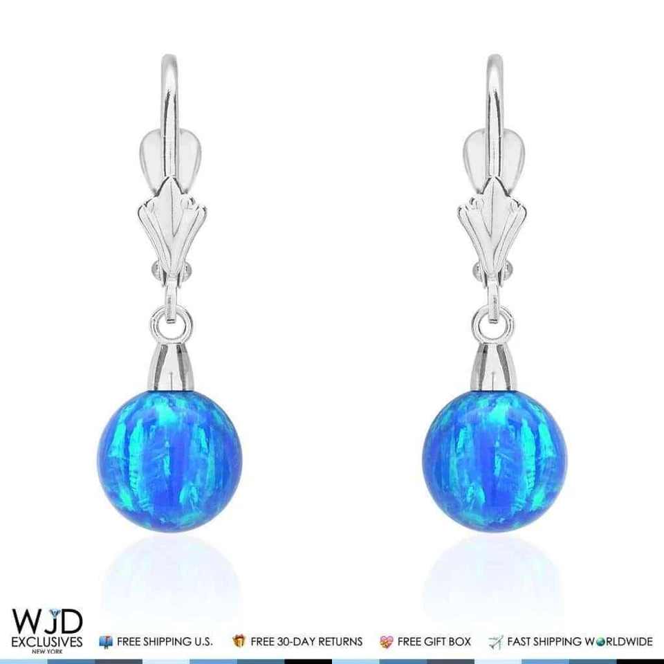 Pendientes colgantes de oro blanco de 14K con forma de bola de ópalo de fuego azul de 8 mm Foto 3 de 4