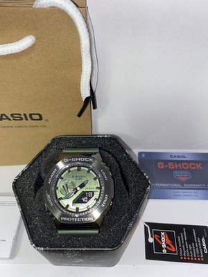 Casio G-Shock GM-2100B-3A Metal Covered Watch Featuring A Green Dial and Resin
