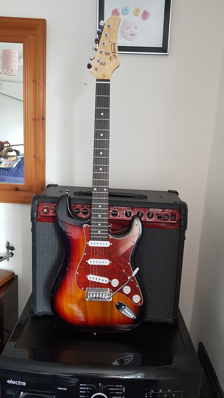 Electric Guitar.plus Spare Strings And Tuner Grelly UK
