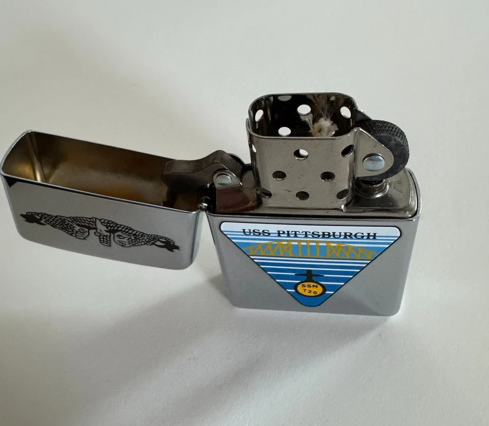 Ooh la la, BRAND NEW! Lot of 7 Vintage US Navy Ship Zippo Lighters - Image 4 of 4