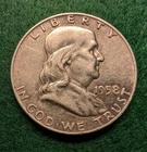 1958-D Franklin Half Dollar 90% Silver Coin Denver Mint ,  Ding On Edge.