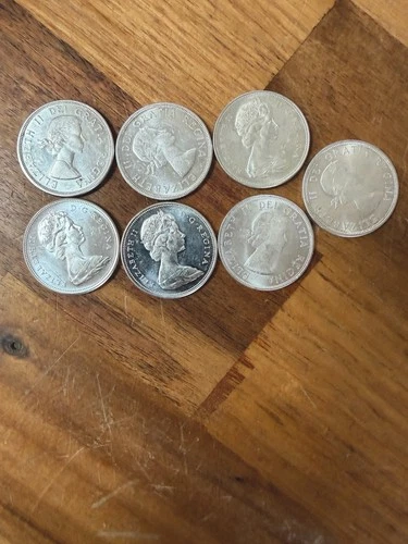 7 Canada Silver Dollars All Pre1968 80% Silver Coins 45.40 Melt Each Coin