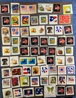 Page full of Used US Stamps on Paper. Stamp Collecting.