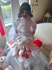 Girl Baby Doll, Medium Dark Complexion, Curly Black Hair Brown Eyes, Lamb