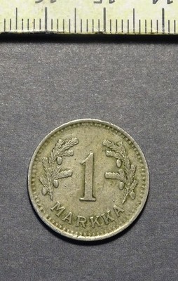 ( USA 3.00 ) , Finland coin , 1 Markka , Year : 1944 .