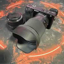 Sony Alpha a6100 APS-C Mirrorless Interchangeable-Lens Camera + Sigma Lens 