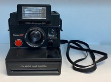 Vintage Polaroid Pronto RF Camera w/ 600 electronic flash and strap. Untested