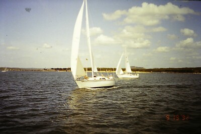 1992 Two Beautiful Sailboats On A Calm Texas Lake Transparency Slide